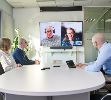 Meeting in Large Boardroom Using Video Conferencing
