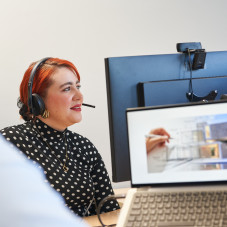 Person Using Cloud Telephony Solution with Headset