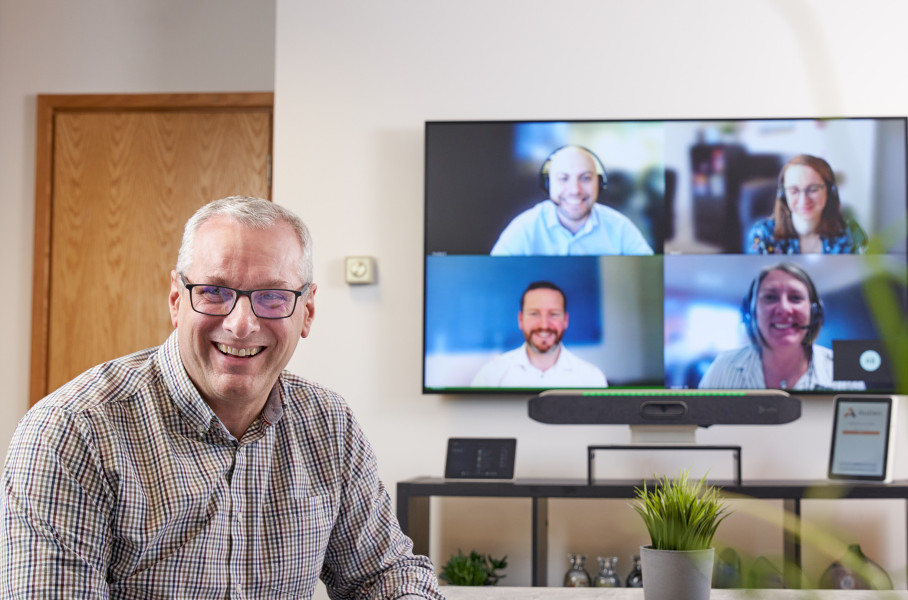 Multiple People on a Video Conference Call in a Meeting Room