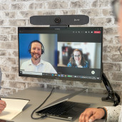 People on a Video Conference Call in a Huddle Space